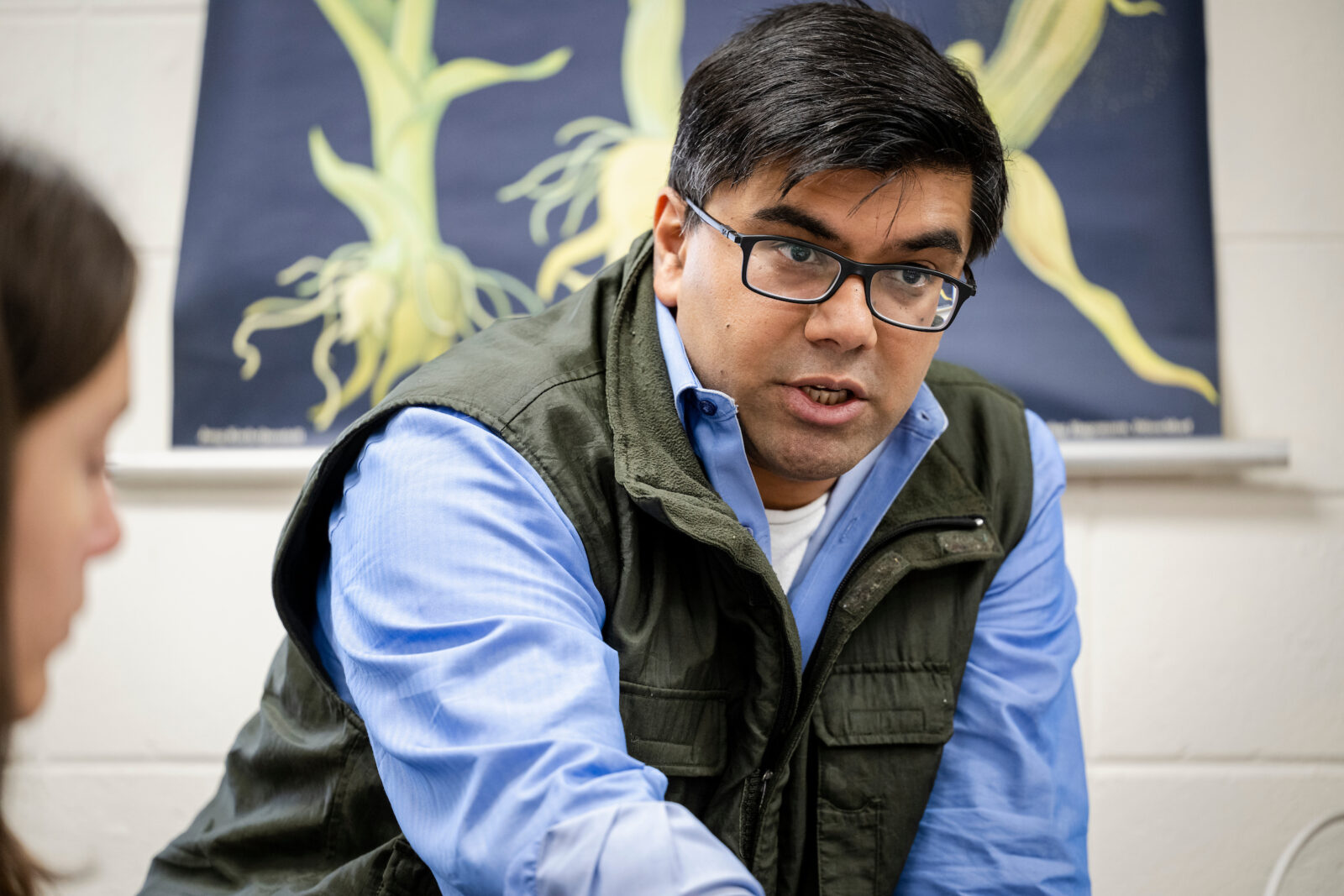 photo of Associate Professor Prashant Sharma gesturing while teaching a Zoology lab.